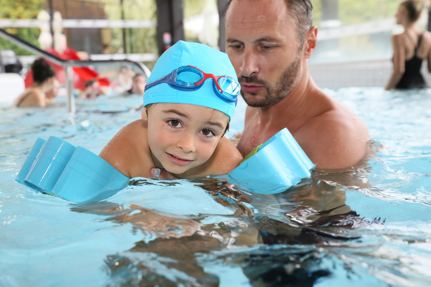 little-boy-learning-how-to-swim